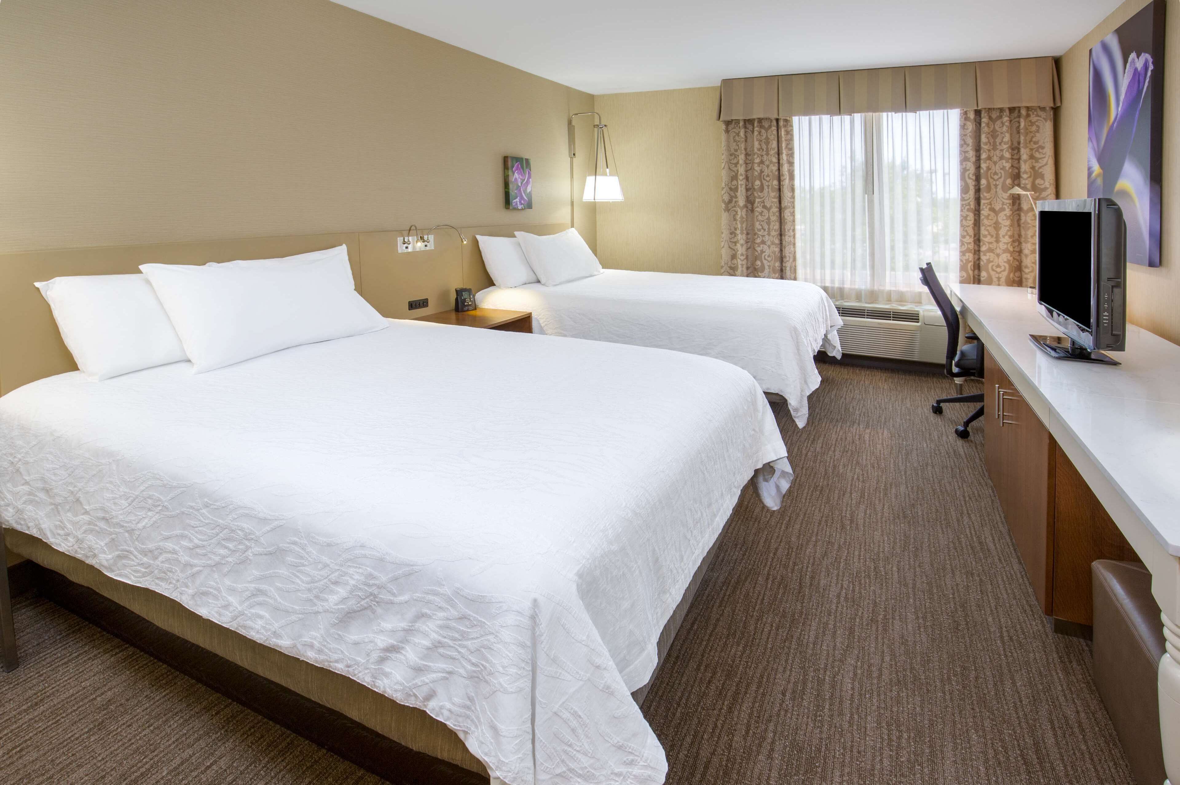 premium bedding, desk, laptop workspace, iron/ironing board