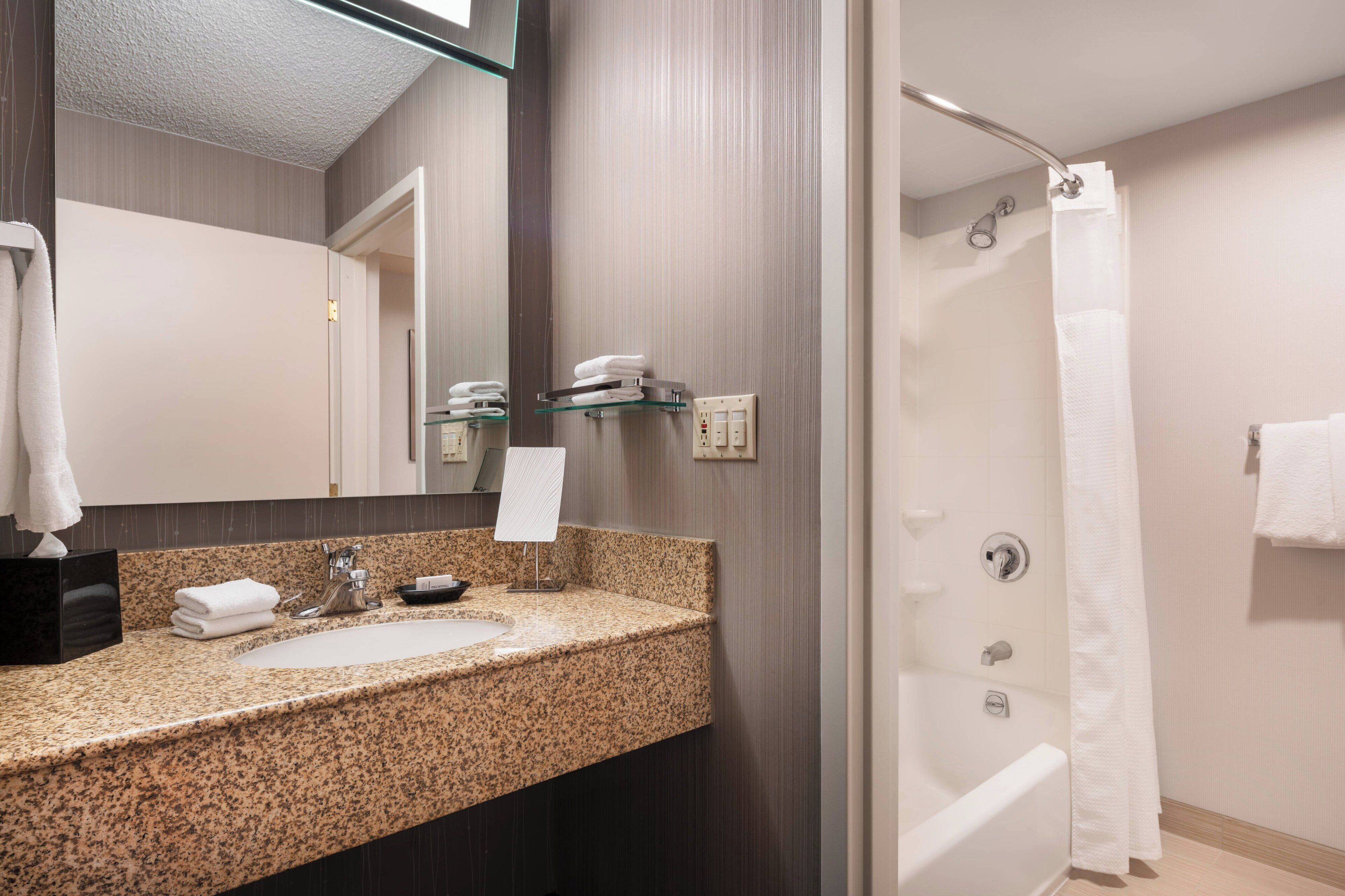 combined shower/bathtub, free toiletries, hair dryer, towels