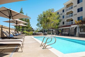 Outdoor pool, open 8:00 AM to 8:00 PM, pool umbrellas, sun loungers