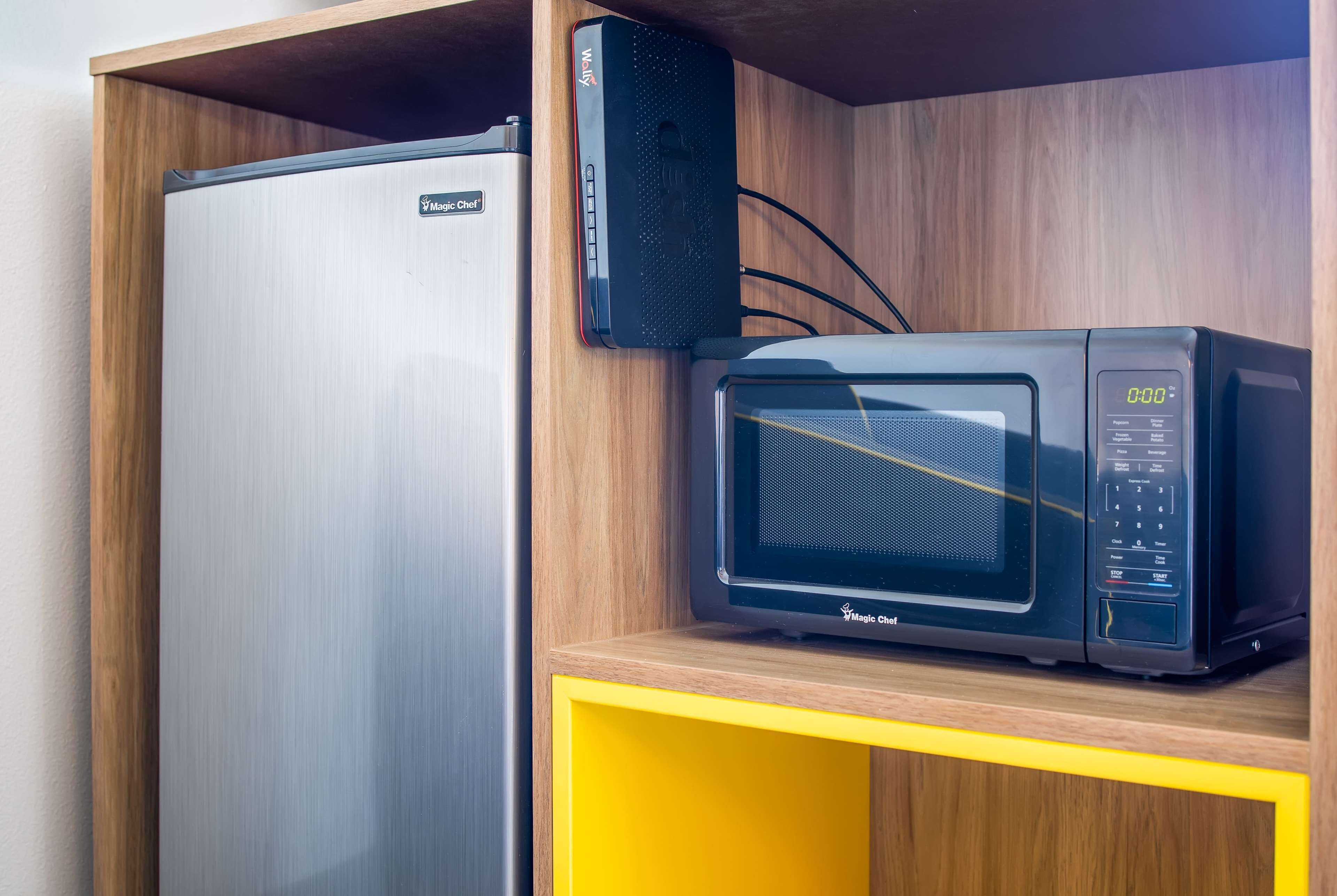 desk, laptop workspace, blackout curtains, iron/ironing board