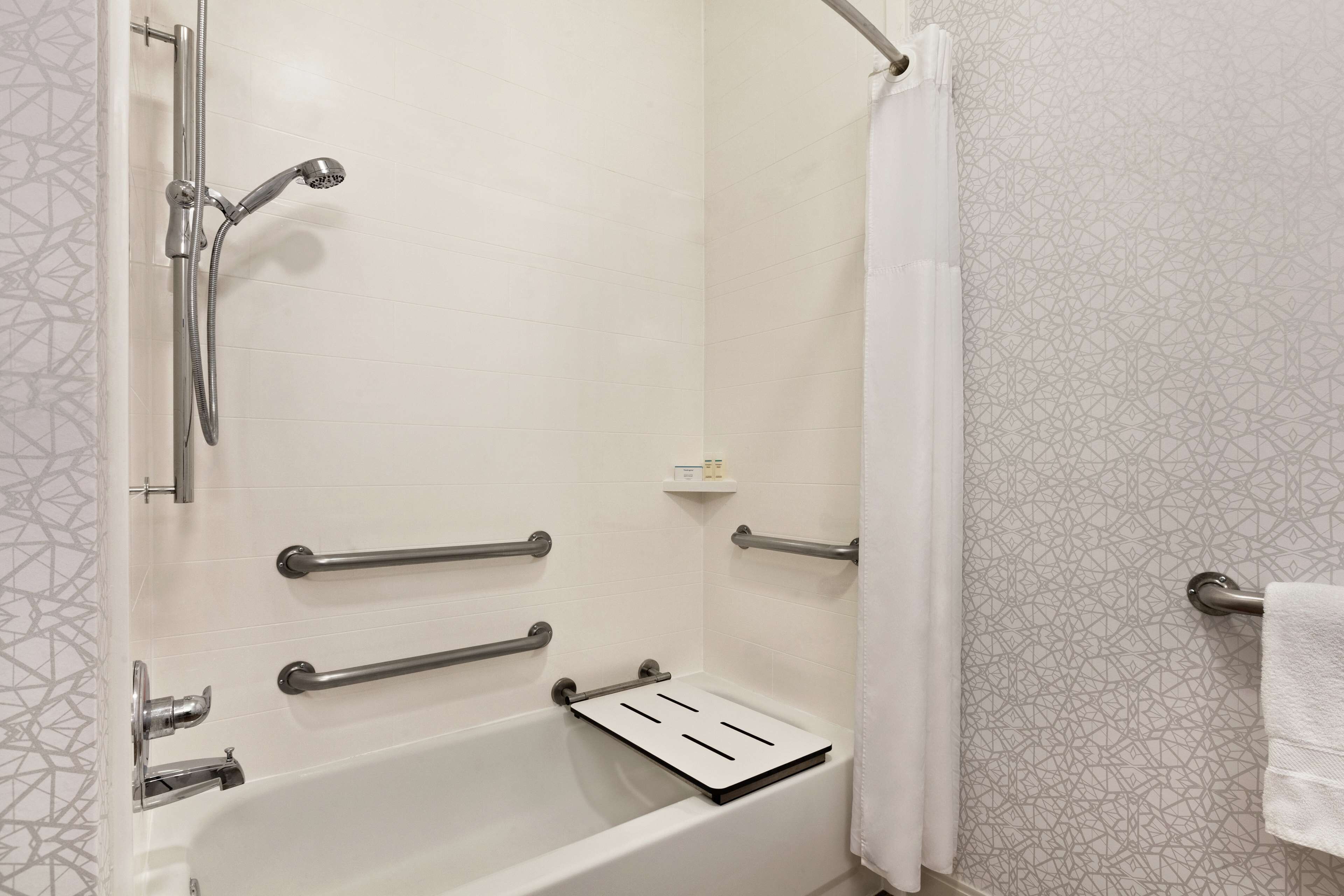 combined shower/bathtub, free toiletries, hair dryer, towels