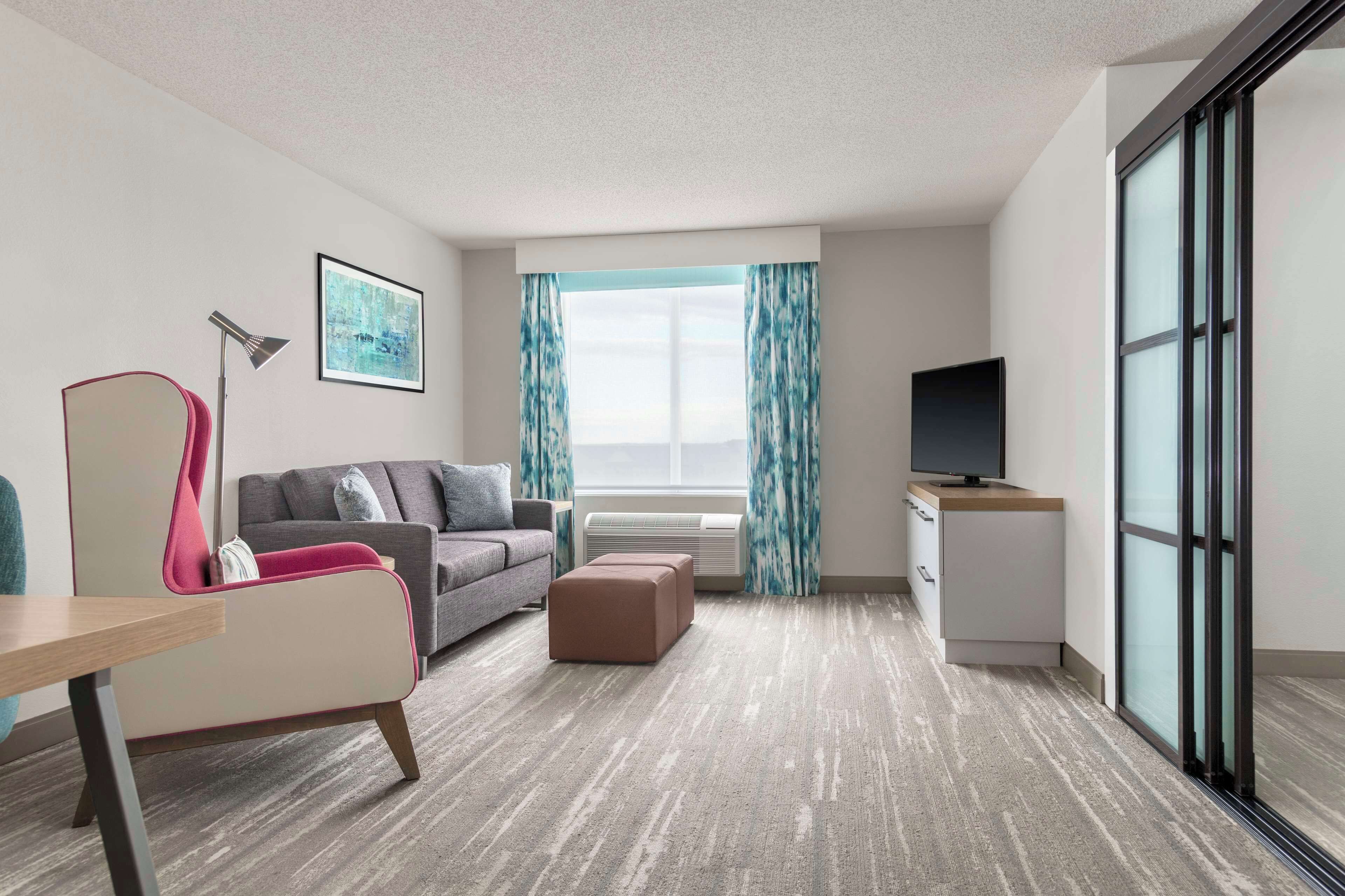 junior suite, 1 bedroom | living area | 49-inch lcd tv with satellite channels, tv, first-run films