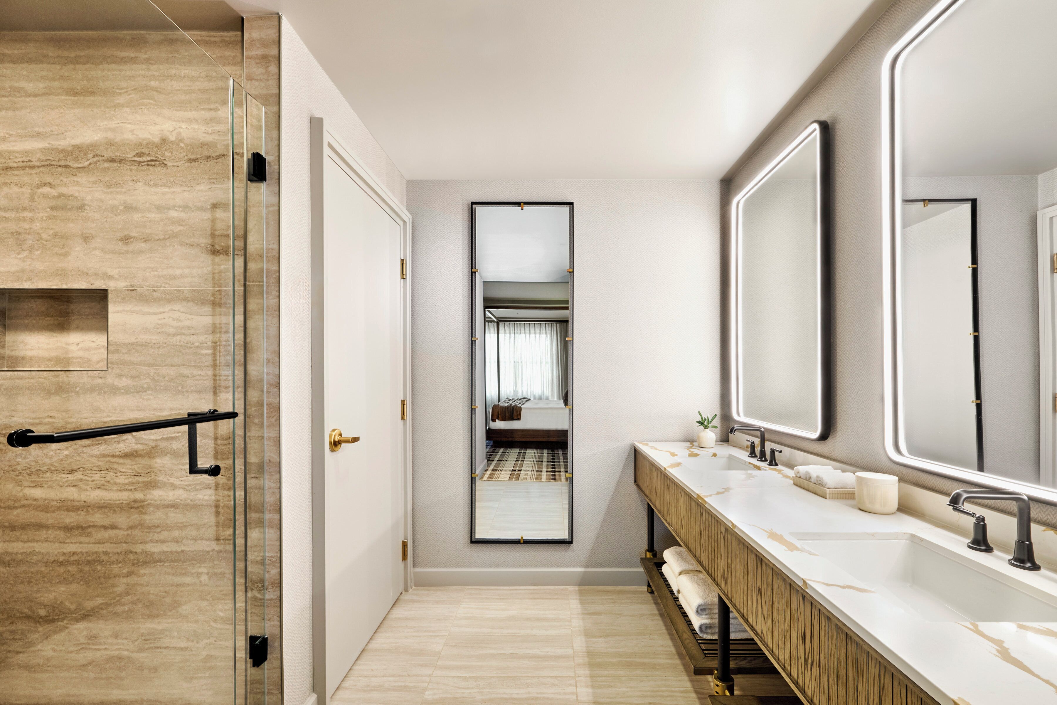 combined shower/bathtub, designer toiletries, hair dryer, bathrobes