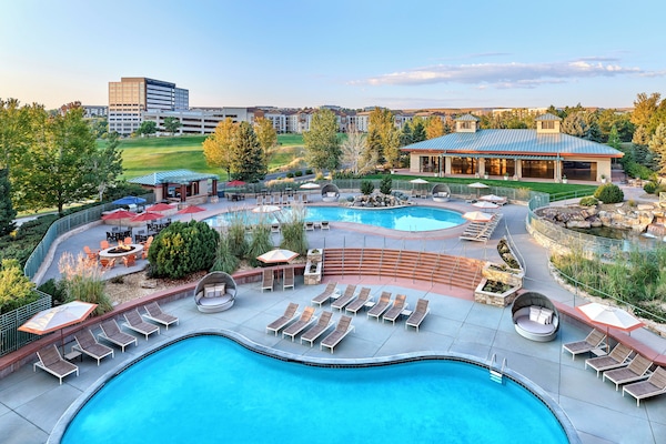 2 outdoor pools, open 8:00 AM to 11:00 PM, pool umbrellas, sun loungers