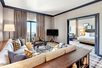 Suite, 1 King Bed, Balcony | Living room | 49-inch LCD TV with cable channels, TV, pay movies at Omni Interlocken