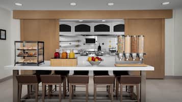 Daily buffet breakfast (USD 15 per person)