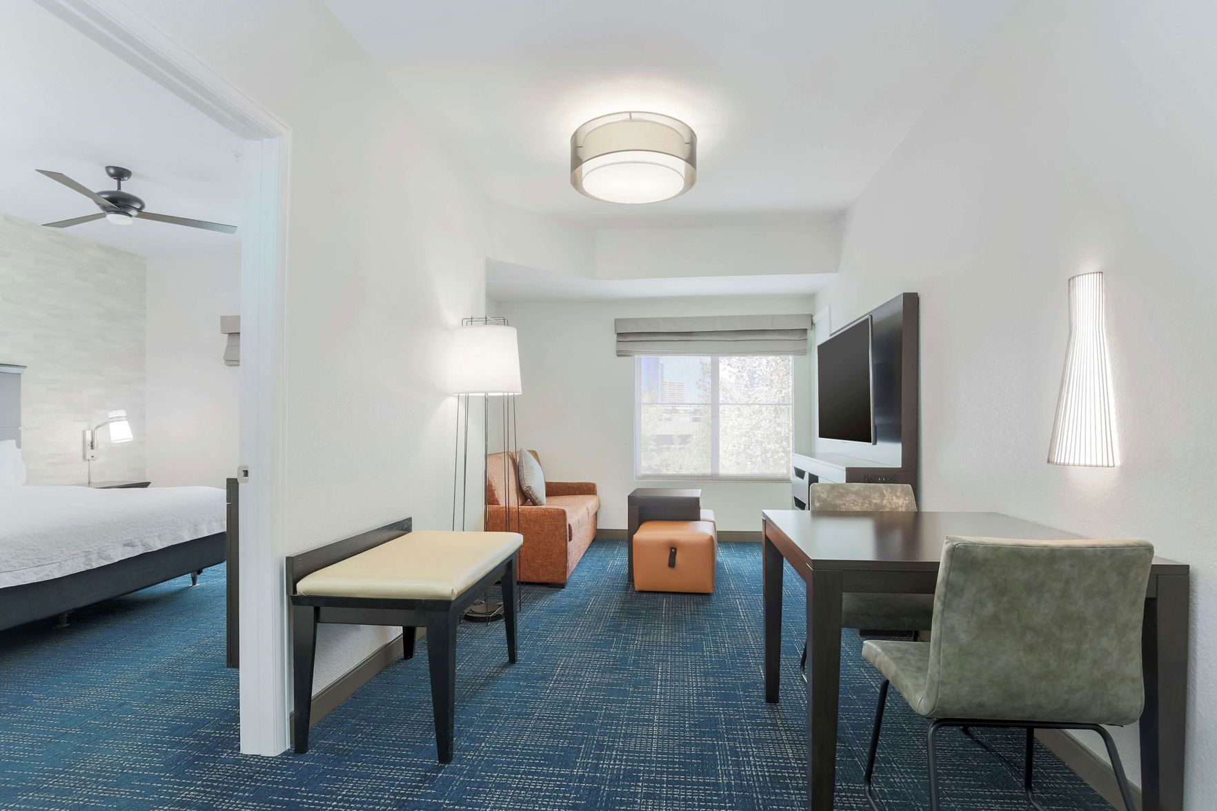 Down comforters, pillowtop beds, desk, laptop workspace