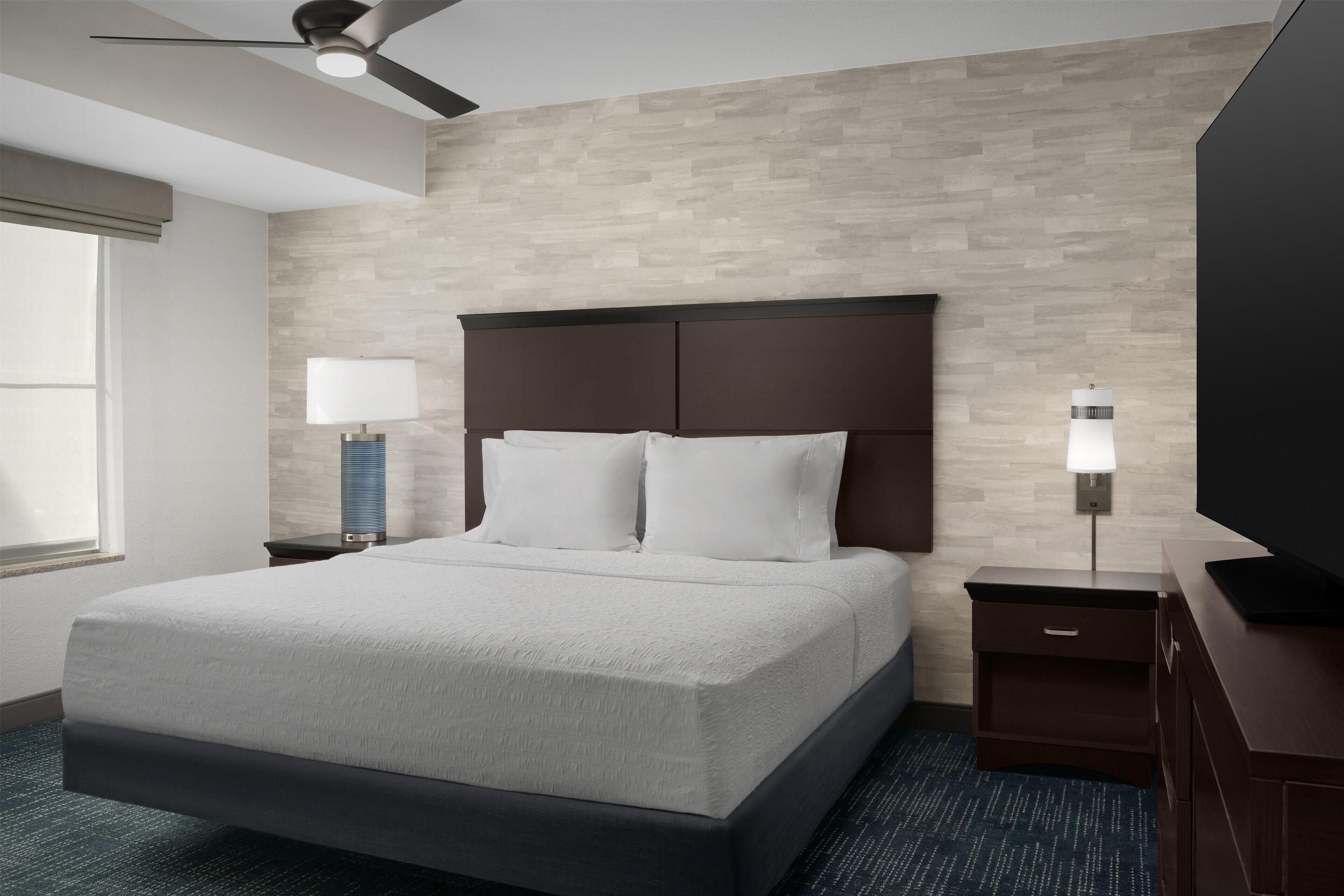 Down comforters, pillowtop beds, desk, laptop workspace