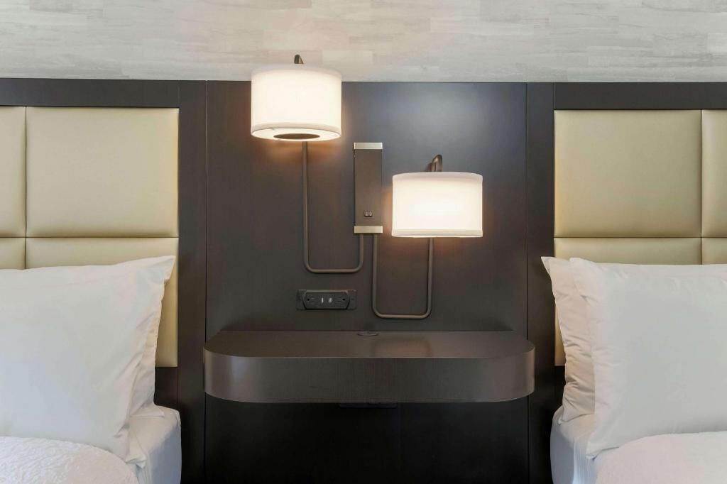 Down comforters, pillowtop beds, desk, laptop workspace