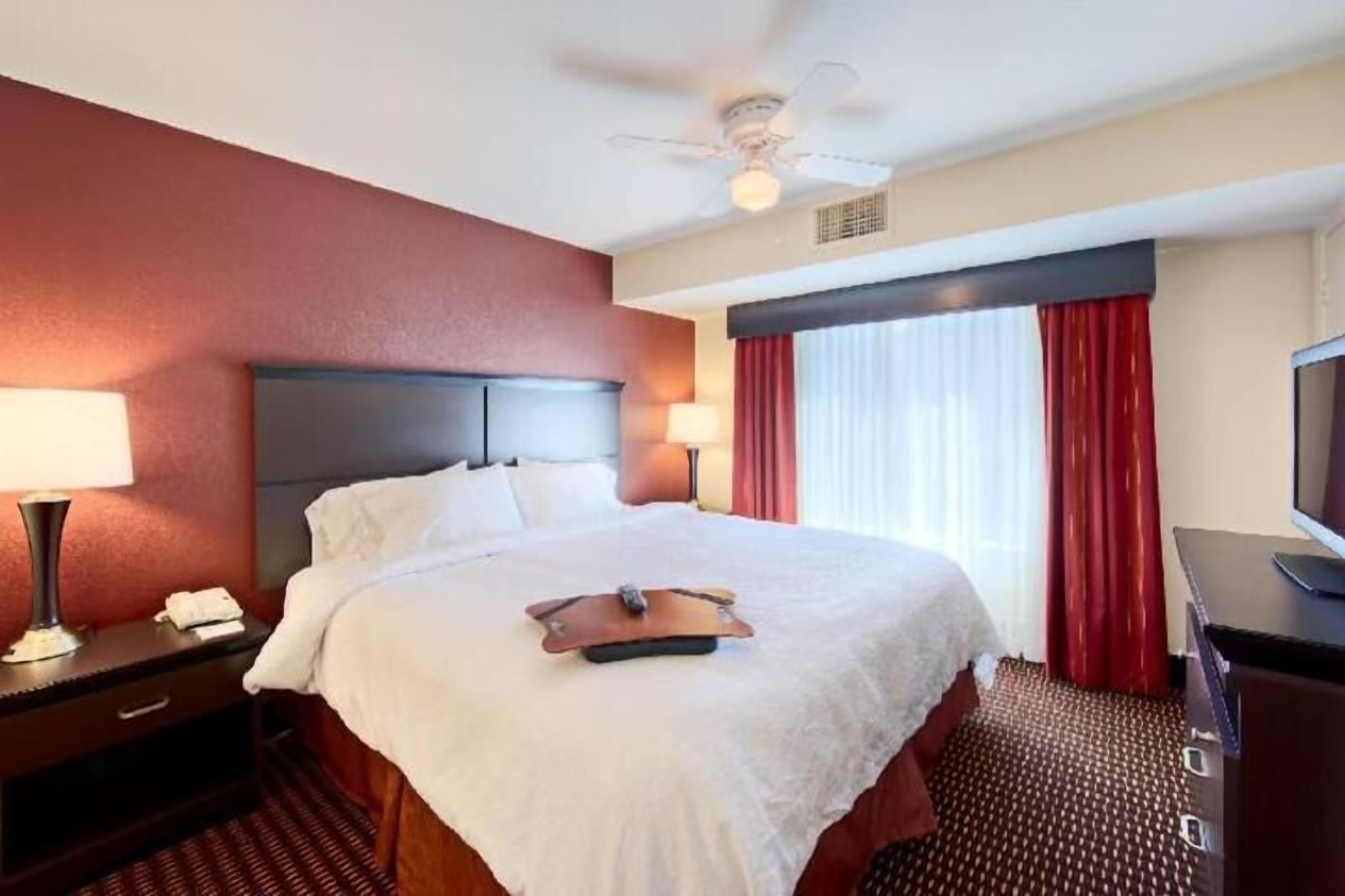Down comforters, pillowtop beds, desk, laptop workspace