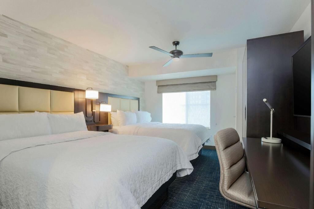 Down comforters, pillowtop beds, desk, laptop workspace