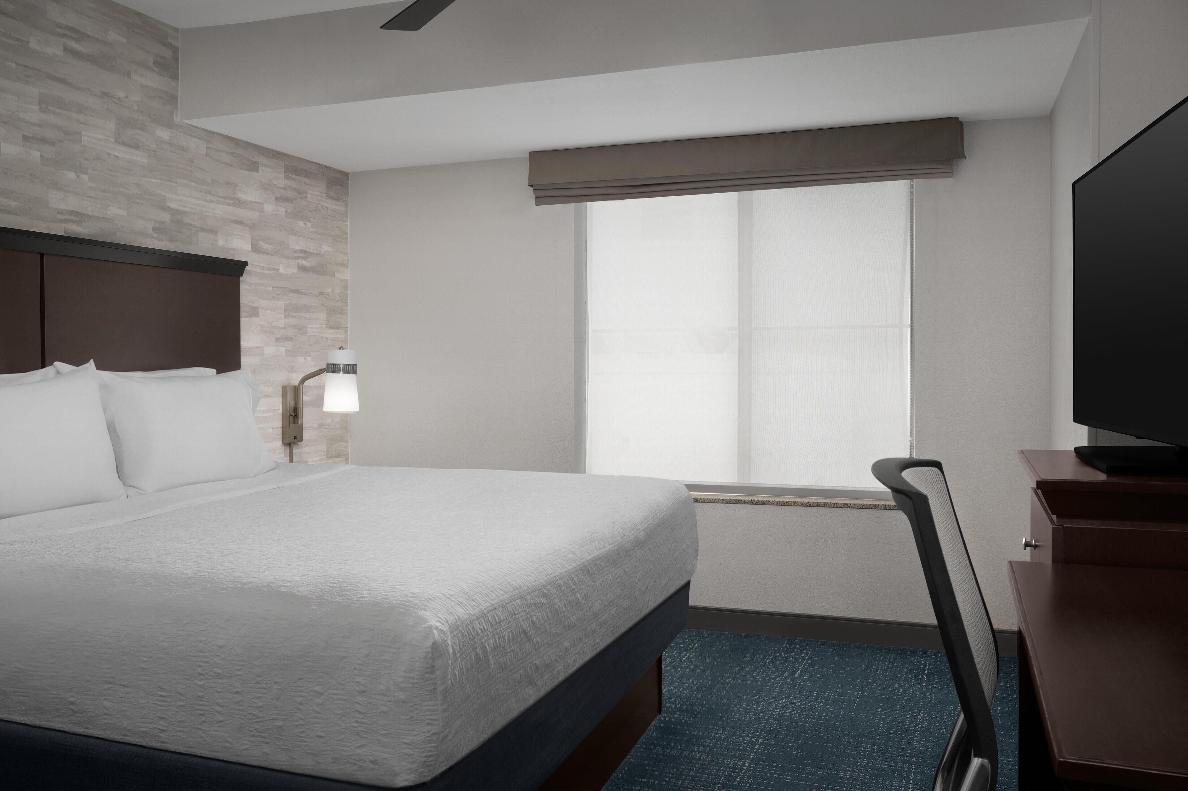 Down comforters, pillowtop beds, desk, laptop workspace