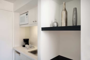 Room, 1 King Bed, Non Smoking, City View (Balcony) | Private kitchenette | Coffee/tea maker, dining tables at MB Hotel, Trademark Collection by Wyndham