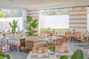 Breakfast, lunch, brunch served; Mediterranean cuisine, beach views 