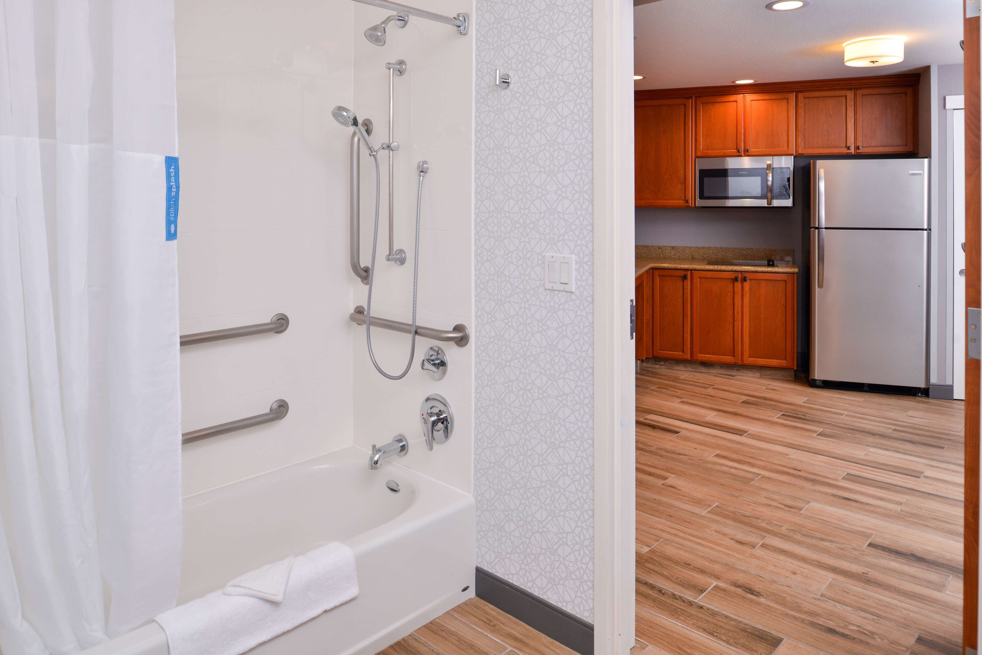suite, 2 queen beds, accessible, bathtub (mobility & hearing) | bathroom | combined shower/bathtub, free toiletries, hair dryer, towels