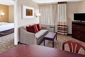 Suite, 1 Queen Bed, Non Smoking (One-Bedroom Sutie) | Blackout drapes, iron/ironing board, free WiFi, bed sheets
