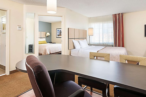 Suite, 2 Queen Beds (One Bedroom Suite - Two Queens) | Desk, blackout drapes, iron/ironing board, free WiFi