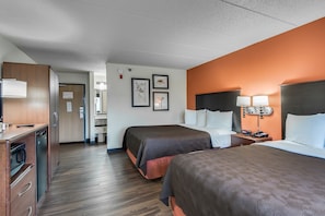 Room, 2 Queen Beds, Non Smoking | In-room safe, desk, laptop workspace, blackout drapes