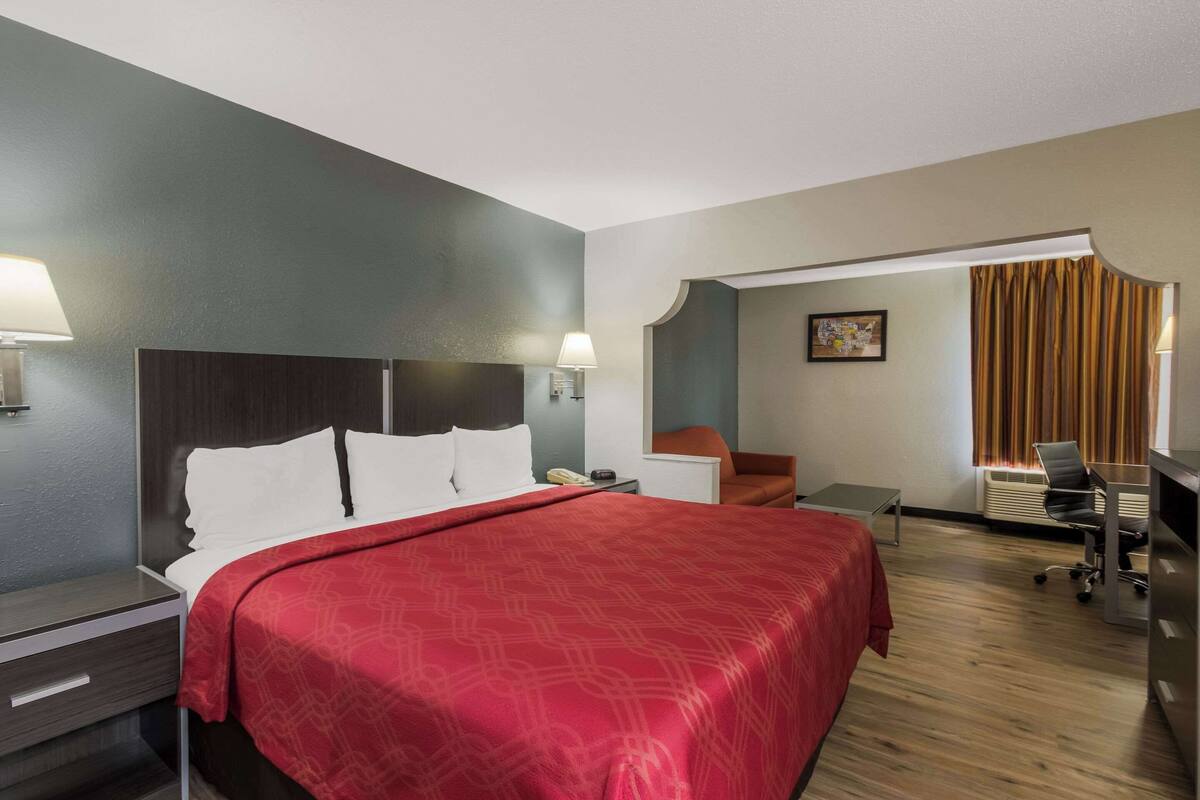 Room, 1 King Bed | In-room safe, desk, iron/ironing board (on request), WiFi (free)