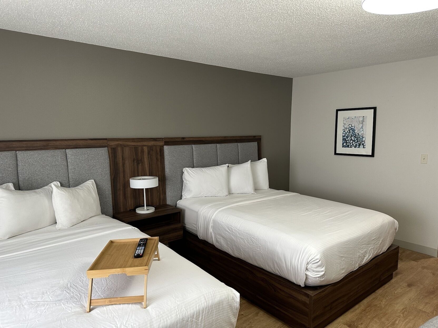 Premium bedding, desk, laptop workspace, blackout curtains