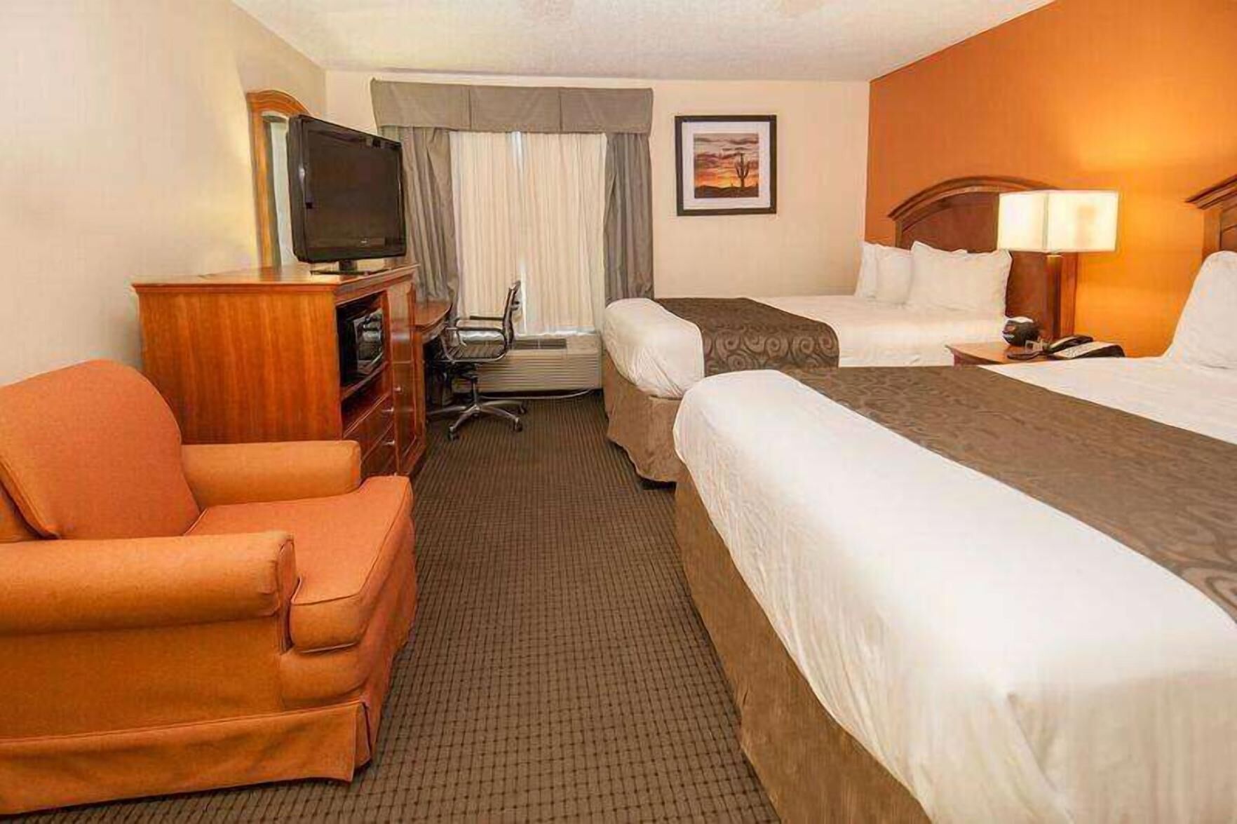 Premium bedding, desk, laptop workspace, blackout curtains