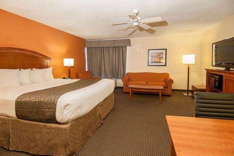Premium bedding, desk, laptop workspace, blackout curtains