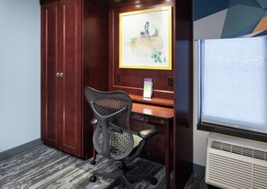 Enjoy a comfortable stay with a spacious desk and a stylish wardrobe, perfect for working or relaxing.