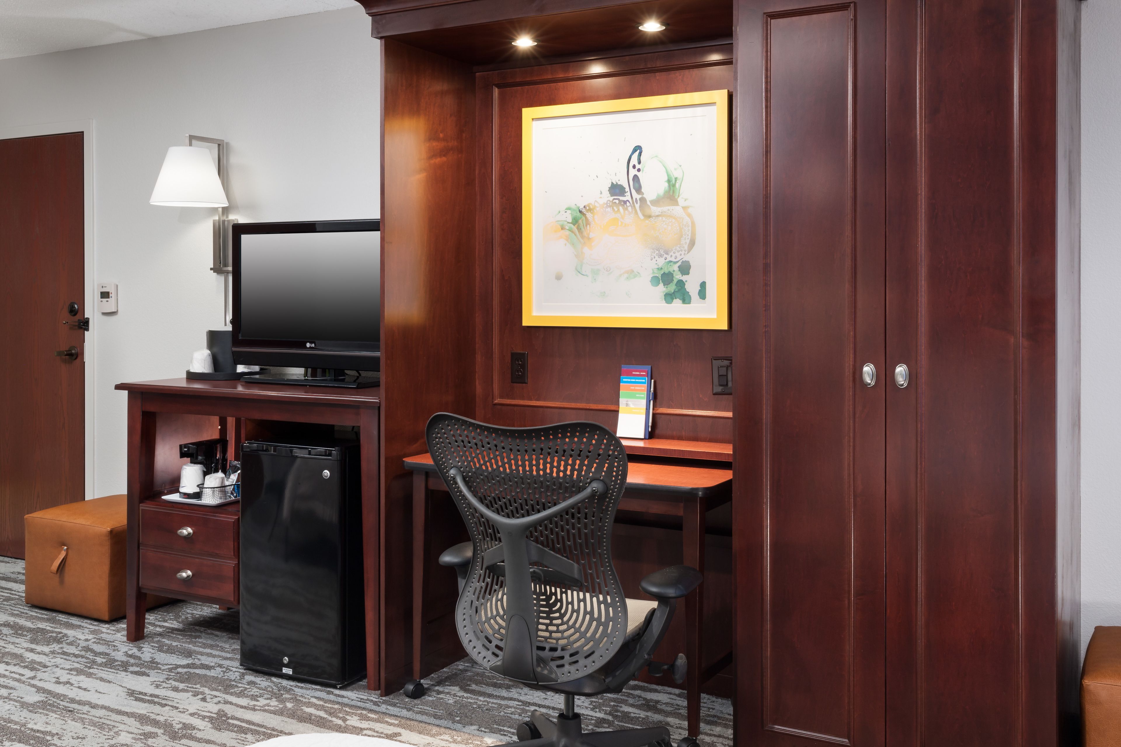 desk, blackout curtains, iron/ironing board, free cots/infant beds