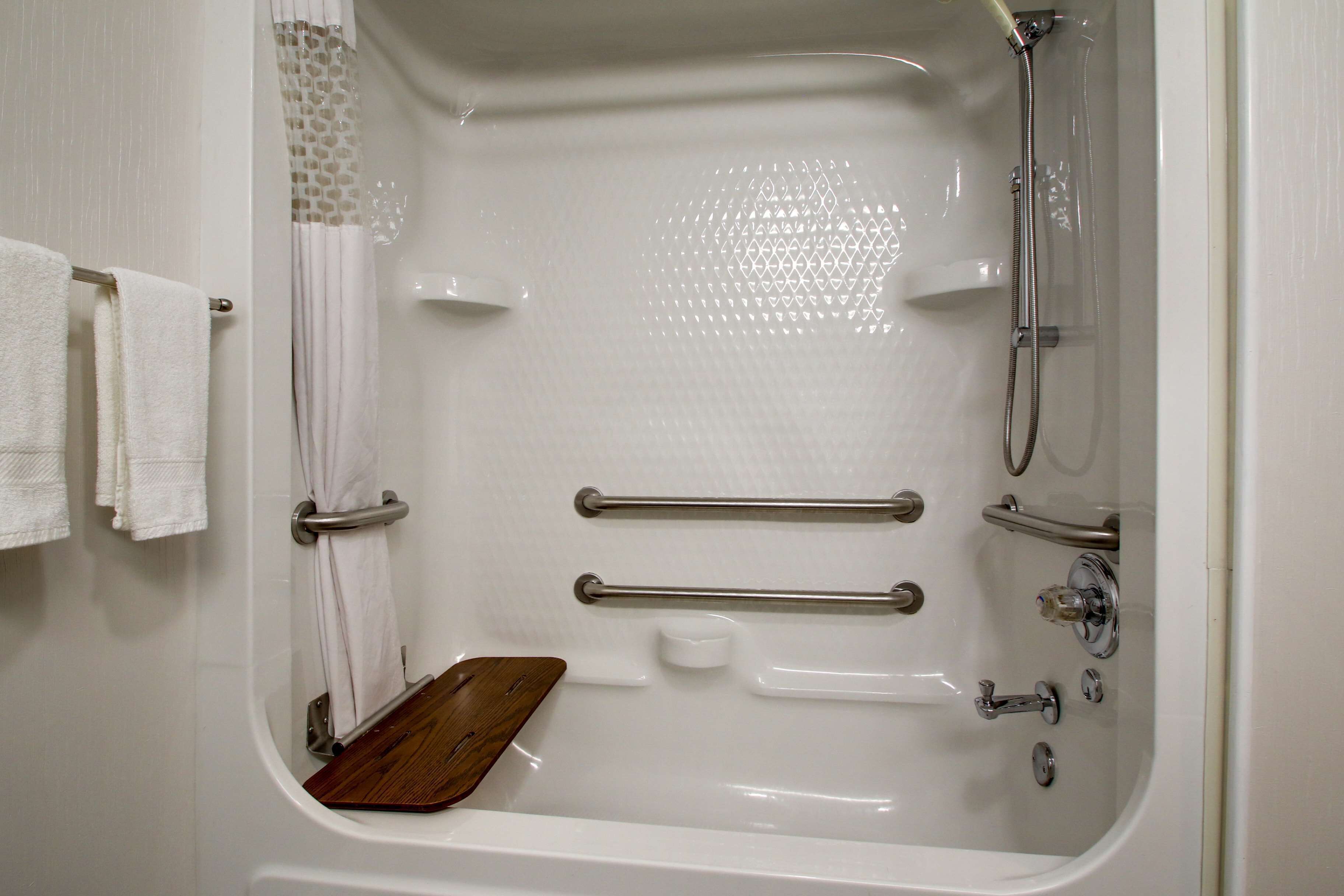 room, 1 king bed, accessible, non smoking | bathroom | designer toiletries, hair dryer, towels, soap