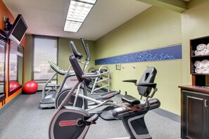 A gym with stationary bikes, treadmills, and exercise balls. - Hampton Inn Rolla (Rolla)