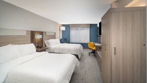 A hotel room with two beds, a desk, a chair, a television, and a wardrobe. - Holiday Inn Express Hotel & Suites Bozeman West by IHG (Bozeman)