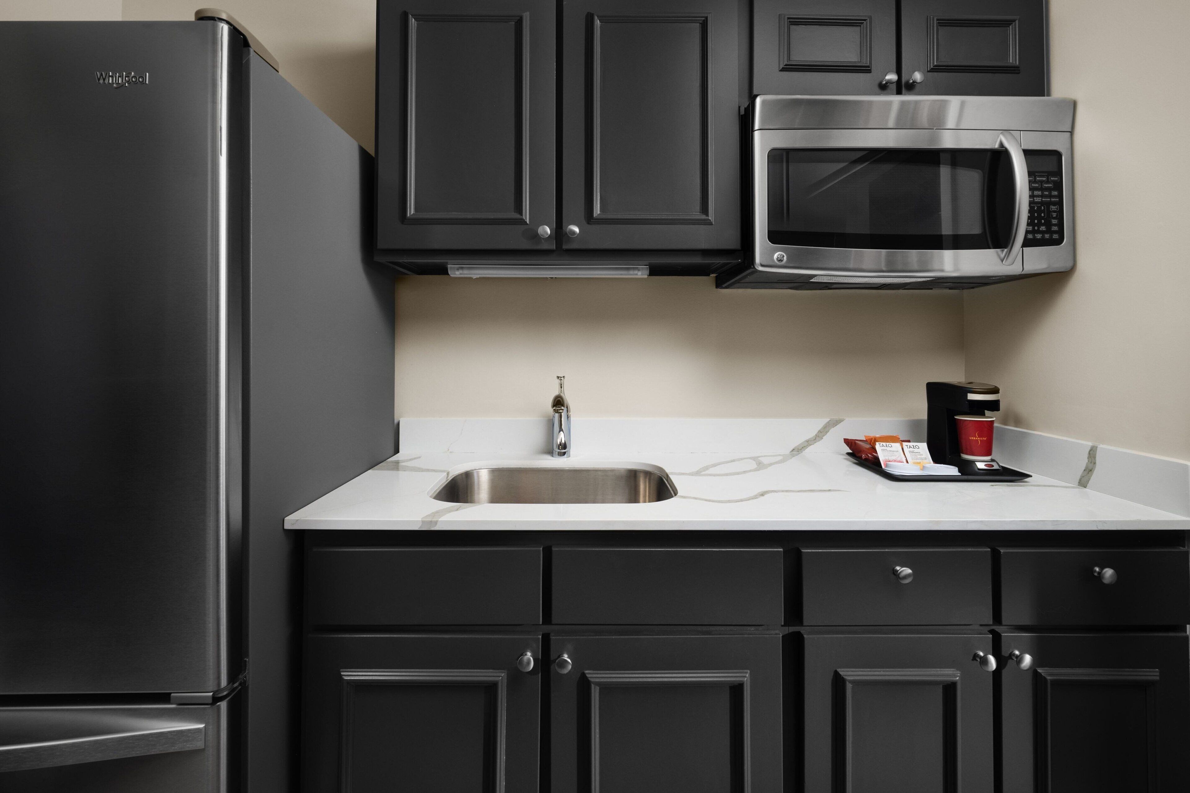 villa, 1 bedroom, pool view | private kitchen | fridge, coffee/tea maker