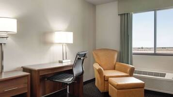 Desk, blackout drapes, iron/ironing board, free cribs/infant beds