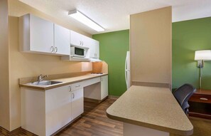 Studio, 1 King Bed, Non Smoking | Private kitchen | Fridge, microwave, stovetop, coffee/tea maker