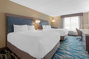 Pillowtop beds, desk, blackout drapes, iron/ironing board