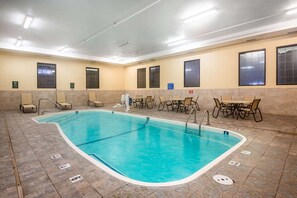 Indoor pool, open 9:00 AM to 11:00 PM, pool loungers