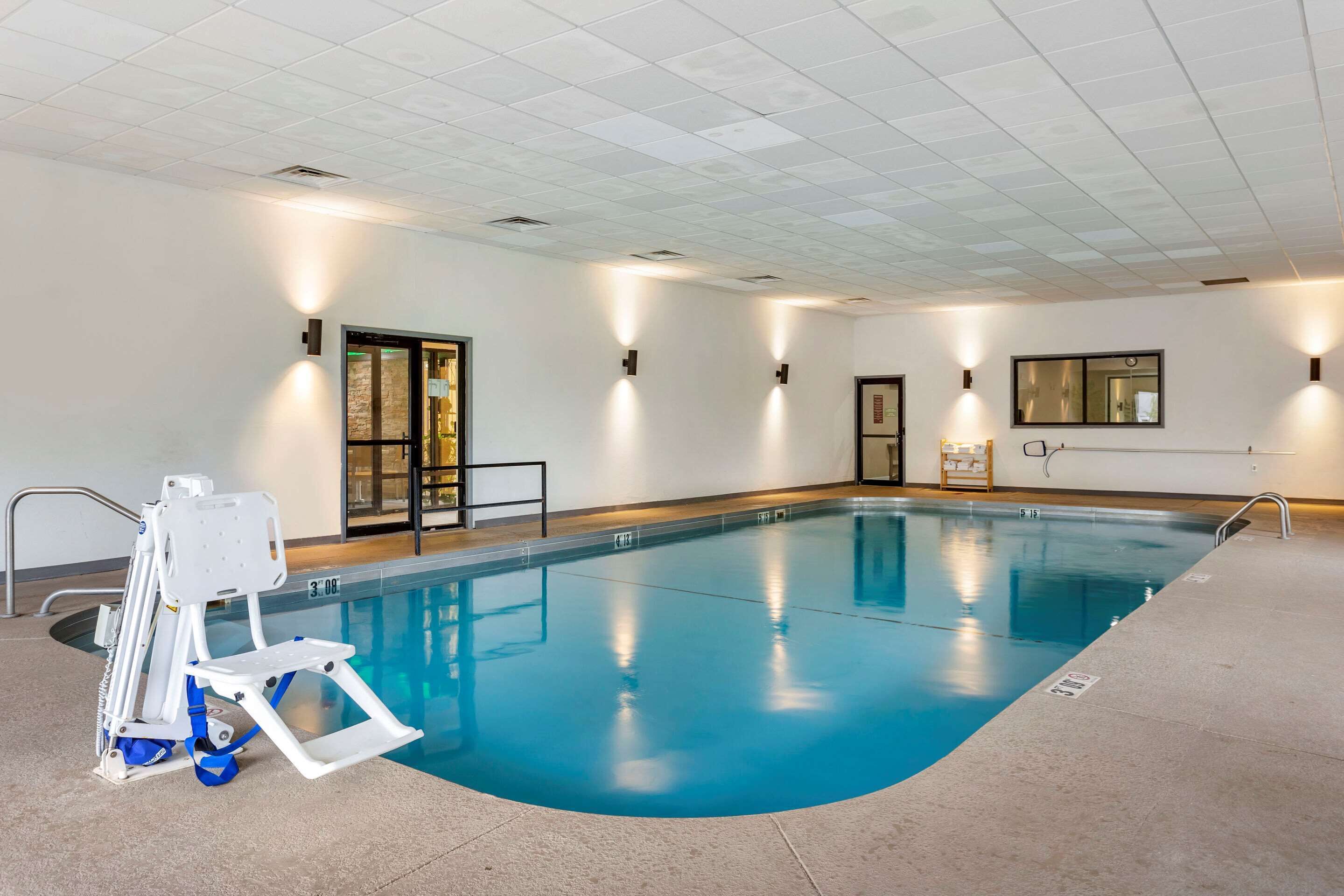 indoor pool, open 7:30 am to 10:00 pm, pool umbrellas, pool loungers
