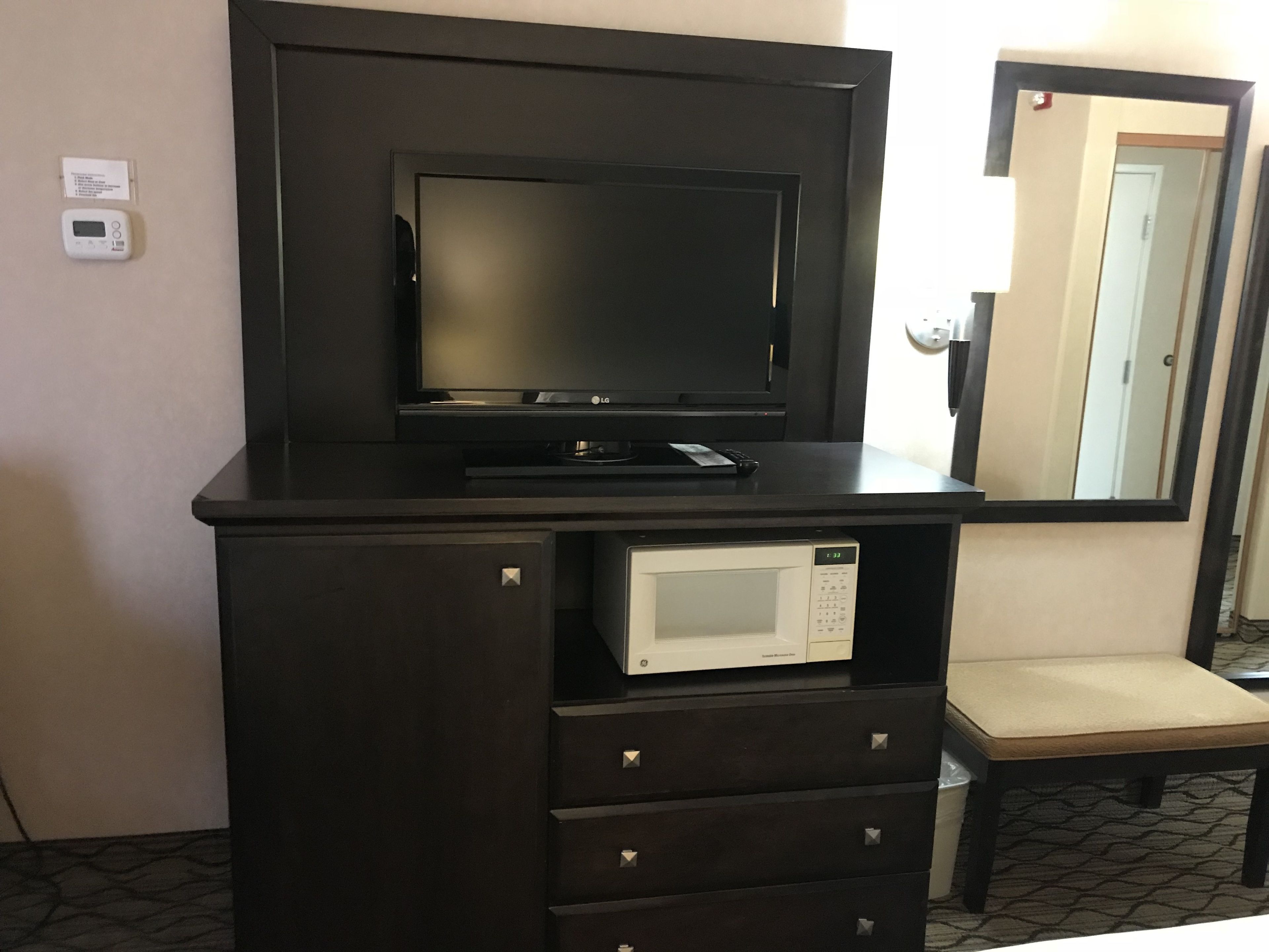 Desk, laptop workspace, iron/ironing board, cots/infant beds