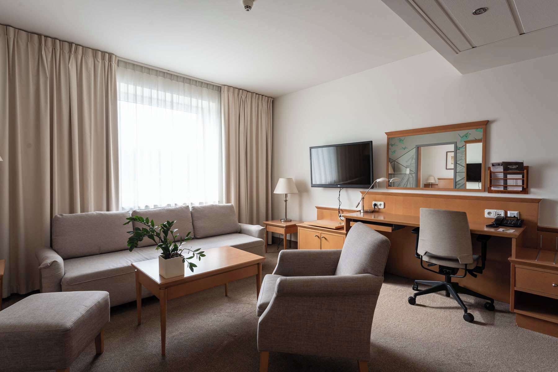 junior suite | 1 bedroom, premium bedding, in-room safe, desk
