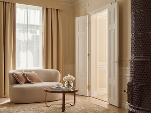 Executive Suite, 1 Bedroom | Living area | 52-inch Smart TV with digital channels, heated floors