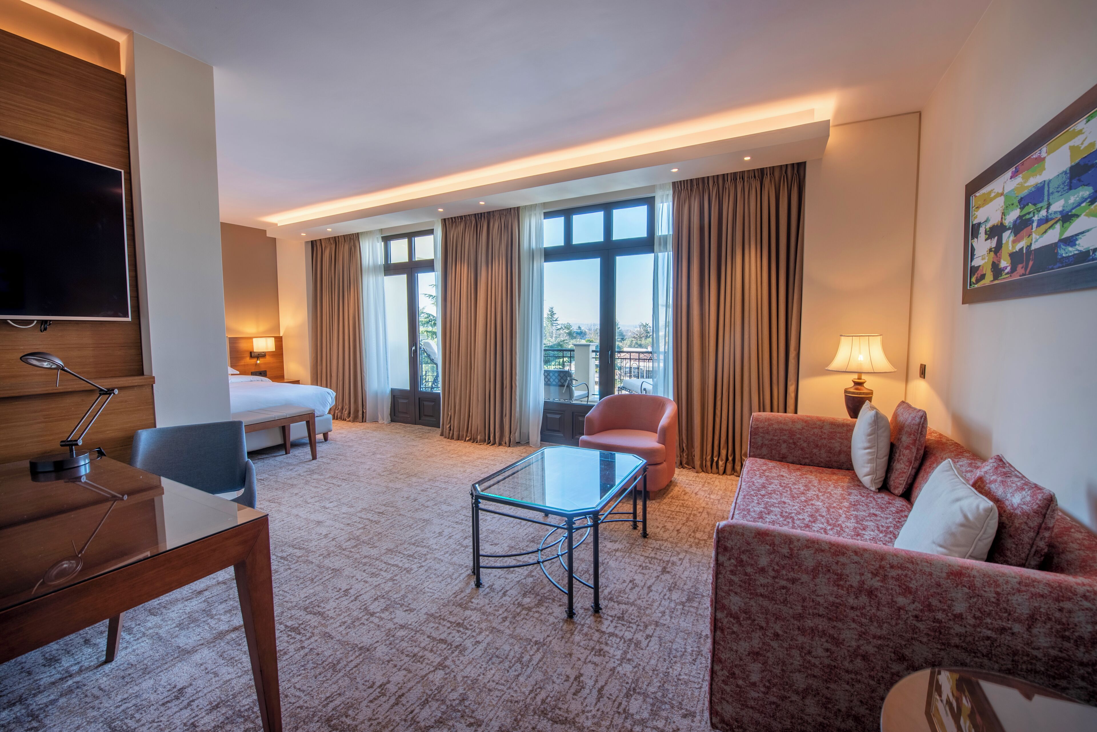 deluxe room, 1 king bed, pool view (club access) | living area | 55-inch flat-screen tv with satellite channels, tv