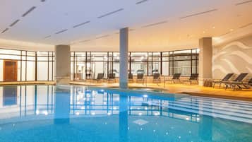 Indoor pool, seasonal outdoor pool, pool umbrellas, pool loungers