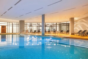 Indoor pool, 2 outdoor pools, open 7:00 AM to 10:00 PM, pool umbrellas