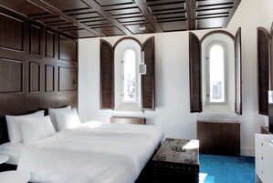 Premium bedding, down duvets, memory-foam beds, in-room safe