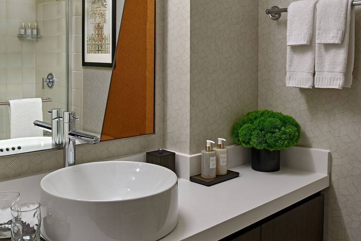 Bathroom | Combined shower/tub, designer toiletries, hair dryer, bathrobes