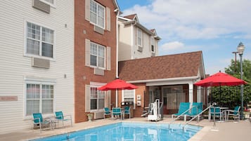 Outdoor pool, open 9:00 AM to 11:00 PM, pool umbrellas, pool loungers