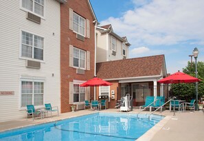 Outdoor pool, open 9:00 AM to 11:00 PM, pool umbrellas, sun loungers