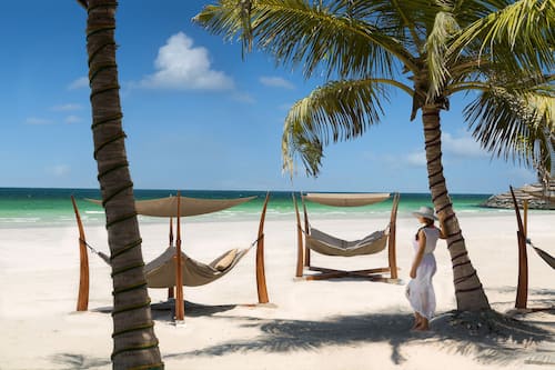 Private beach, white sand, sun-loungers, beach umbrellas