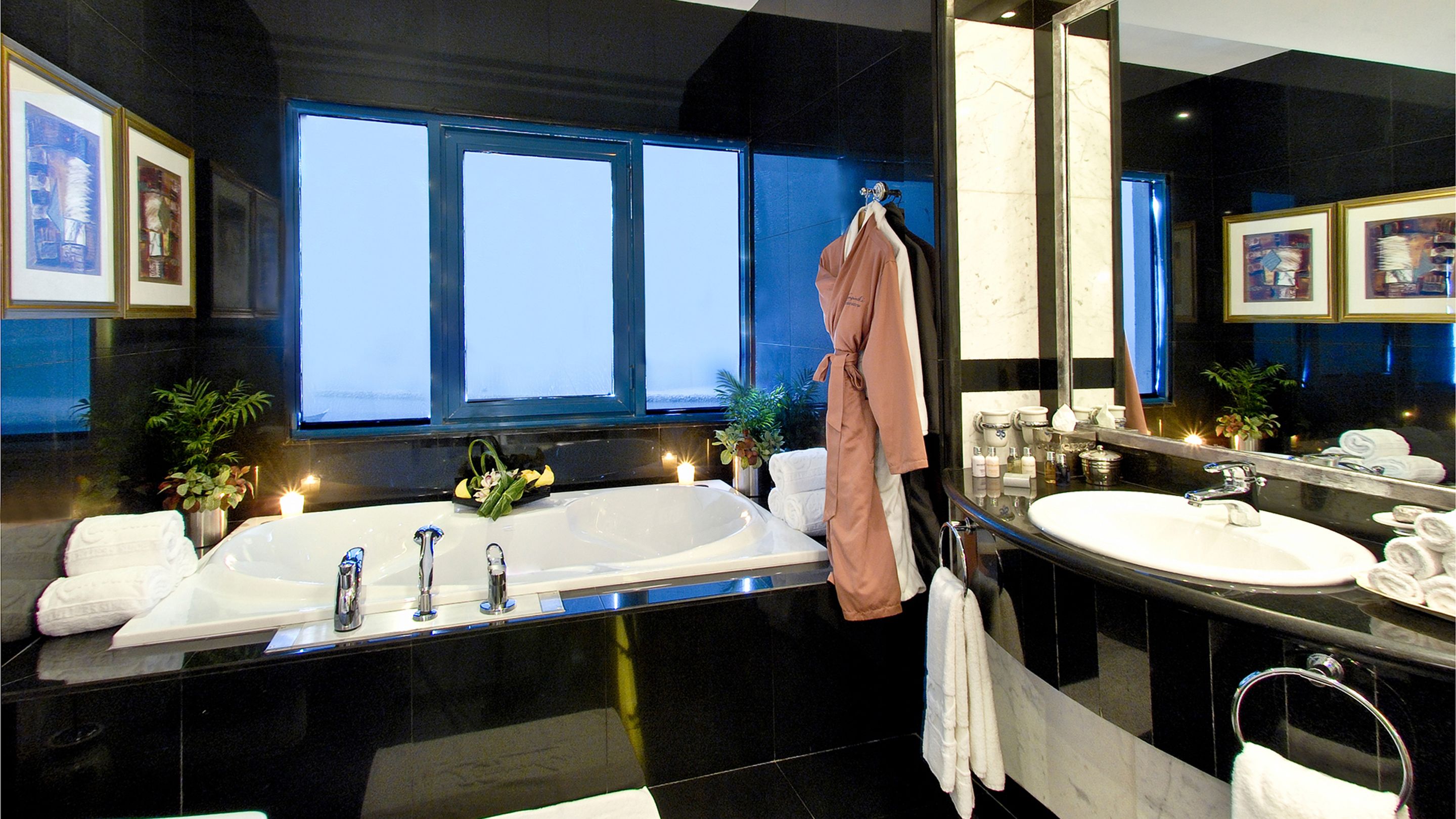 royal suite | bathroom | separate bathtub and shower, rainfall showerhead, free toiletries