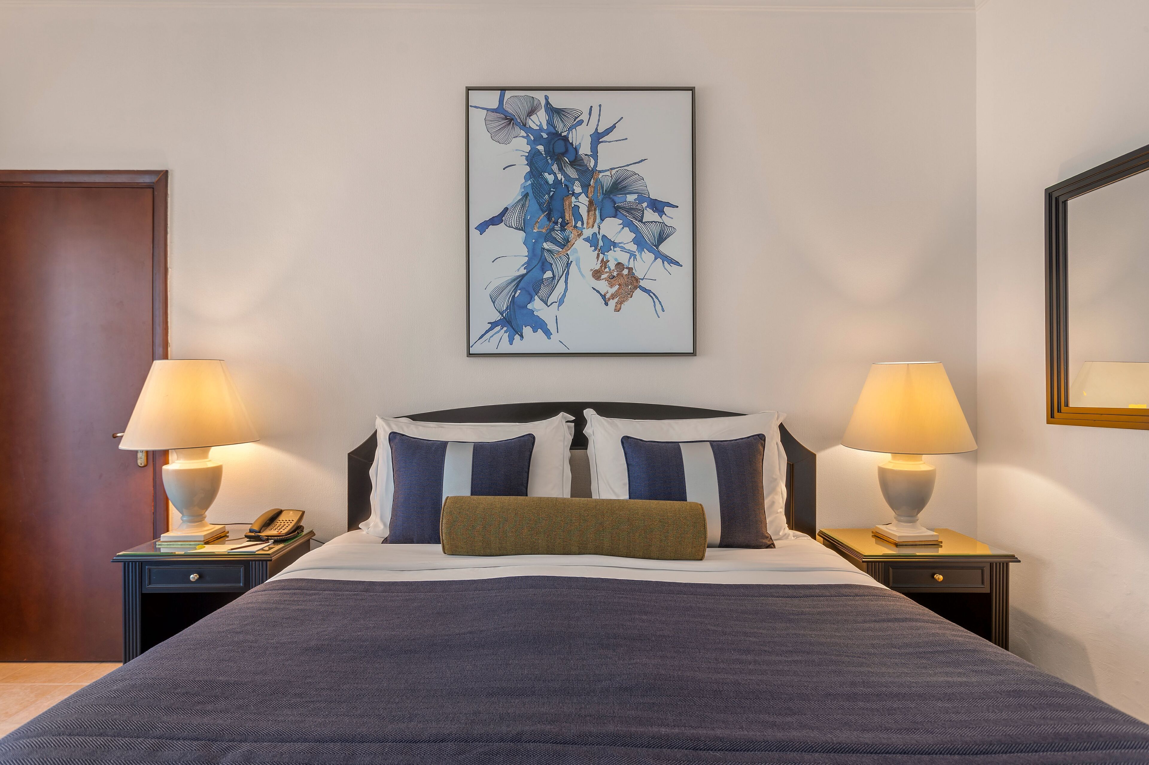 Premium bedding, down comforters, minibar, in-room safe